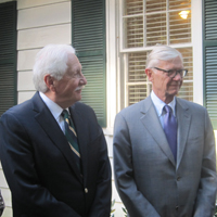W&M President Taylor Reveley and former President Timothy Sullivan take in the ribbon-cutting ceremony.